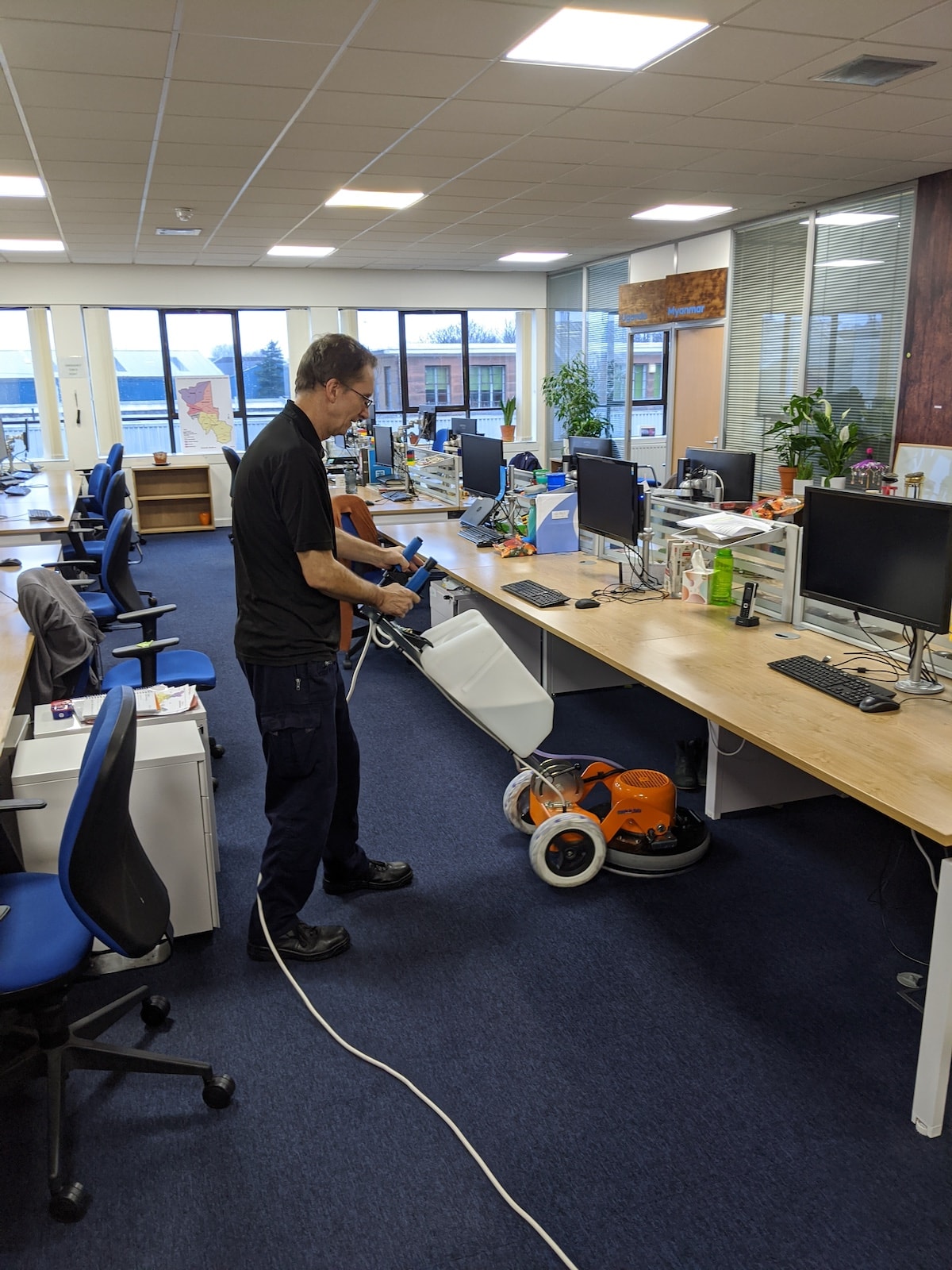 Office Carpet cleaning by professional team member